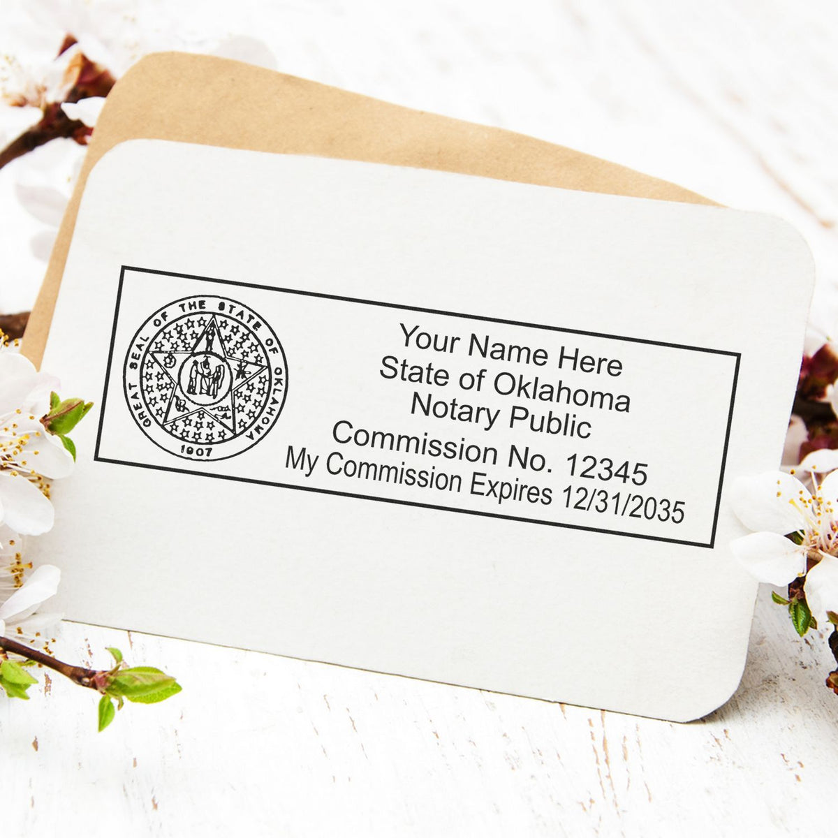 A lifestyle photo showing a stamped image of the Heavy-Duty Oklahoma Rectangular Notary Stamp on a piece of paper