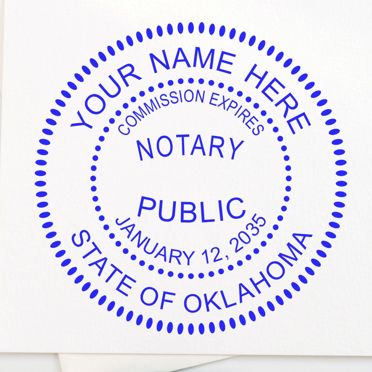 This paper is stamped with a sample imprint of the Round Oklahoma Notary Public Seal Stamp, signifying its quality and reliability.