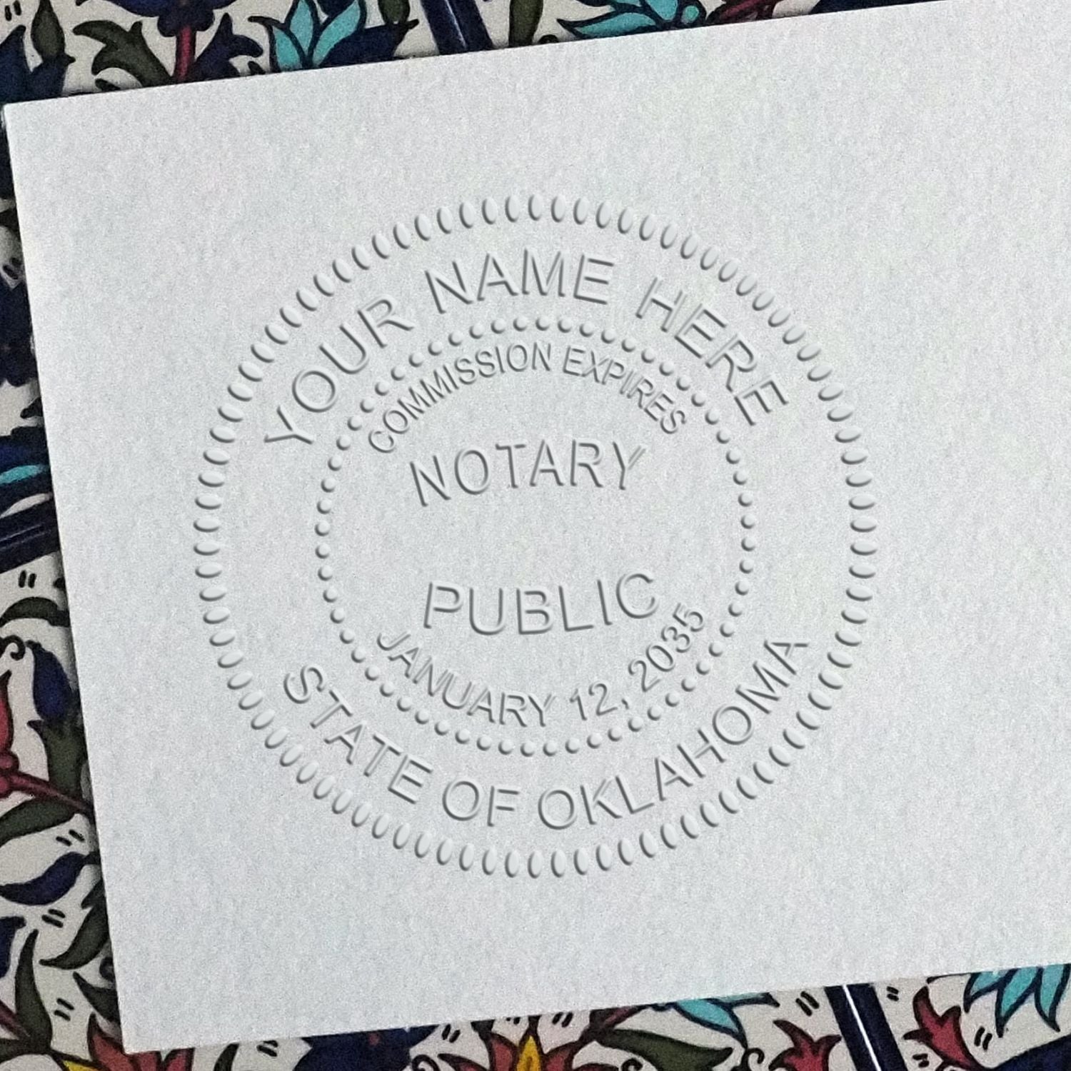 The Oklahoma Handheld Notary Seal Embosser stamp impression comes to life with a crisp, detailed photo on paper - showcasing true professional quality.