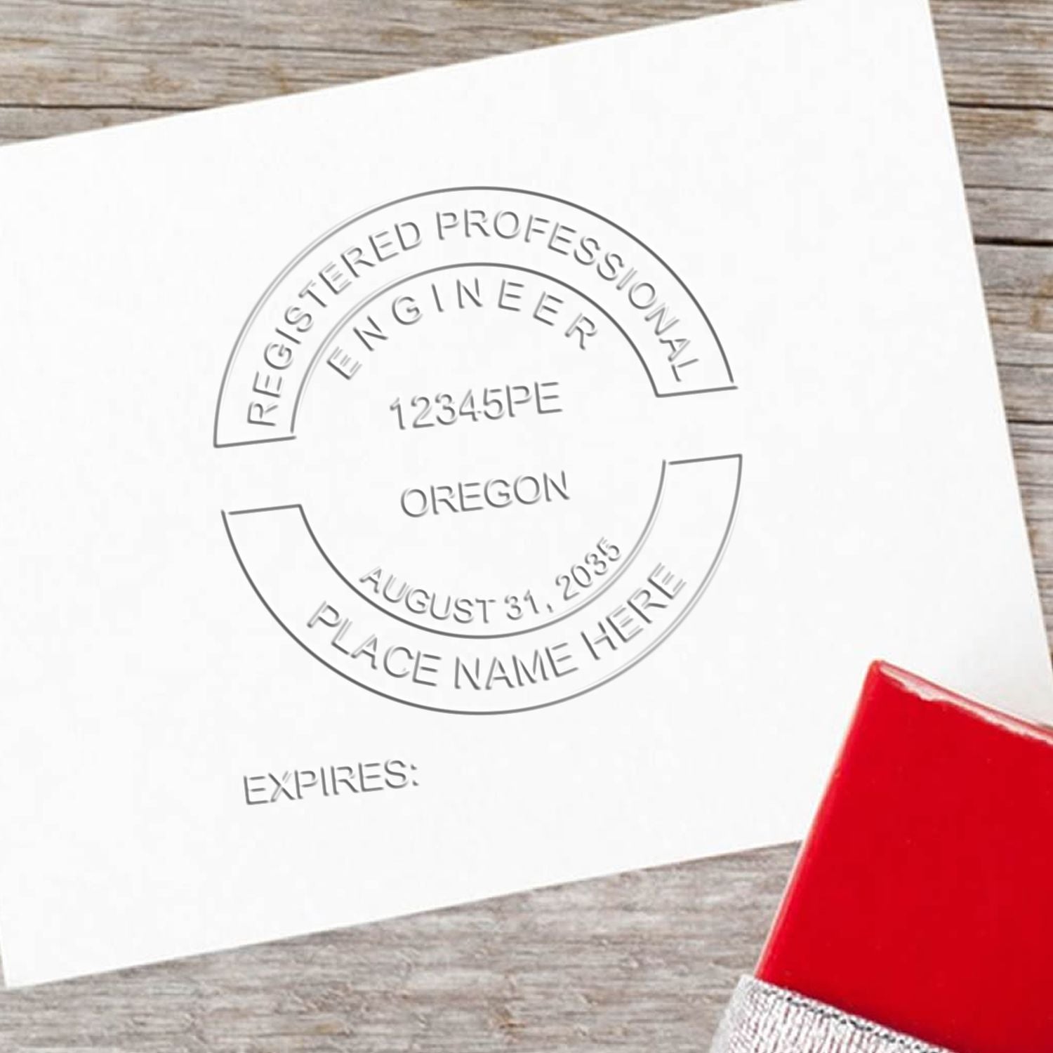 A stamped impression of the Handheld Oregon Professional Engineer Embosser in this stylish lifestyle photo, setting the tone for a unique and personalized product.