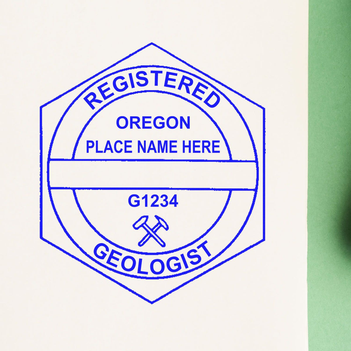 An alternative view of the Slim Pre-Inked Oregon Professional Geologist Seal Stamp stamped on a sheet of paper showing the image in use
