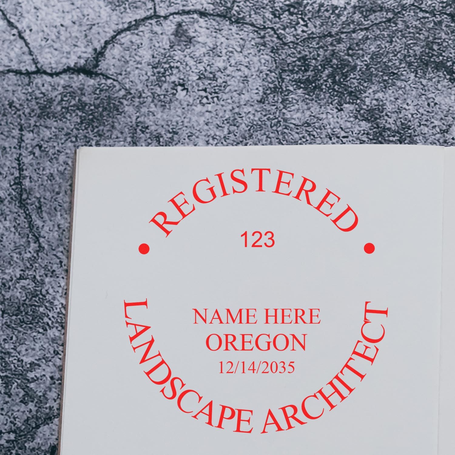 An alternative view of the Premium MaxLight Pre-Inked Oregon Landscape Architectural Stamp stamped on a sheet of paper showing the image in use