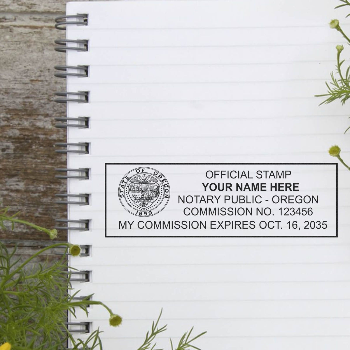 A lifestyle photo showing a stamped image of the Heavy-Duty Oregon Rectangular Notary Stamp on a piece of paper