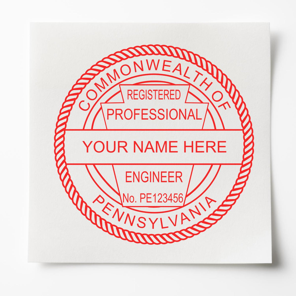 A lifestyle photo showing a stamped image of the Pennsylvania Professional Engineer Seal Stamp on a piece of paper