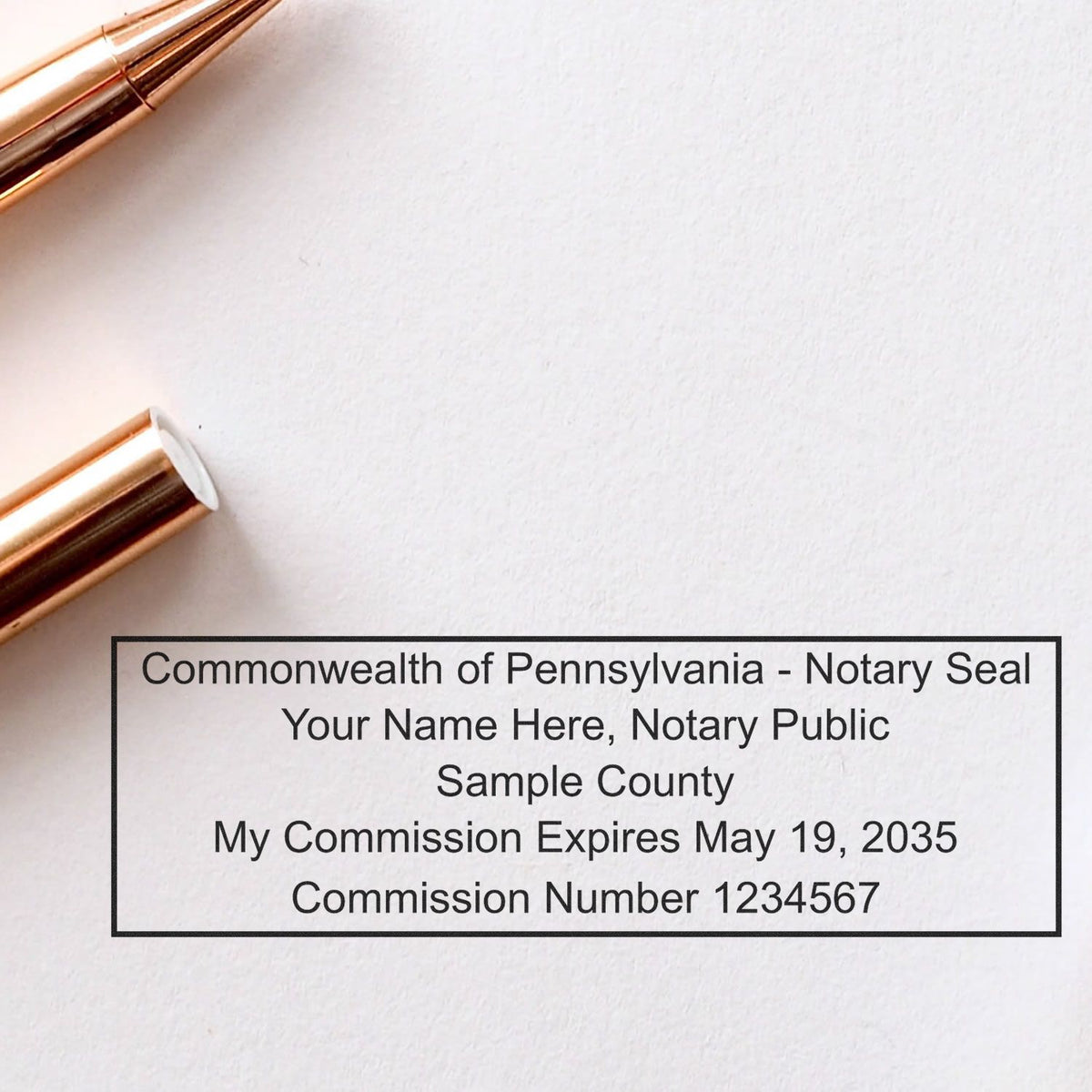 A lifestyle photo showing a stamped image of the Heavy-Duty Pennsylvania Rectangular Notary Stamp on a piece of paper