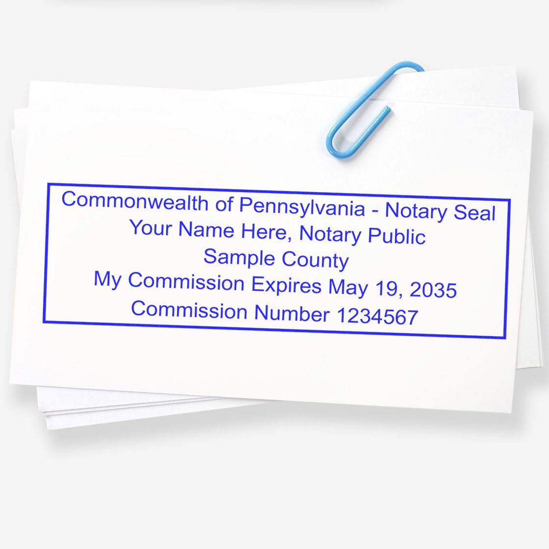 This paper is stamped with a sample imprint of the Wooden Handle Pennsylvania Rectangular Notary Public Stamp, signifying its quality and reliability.