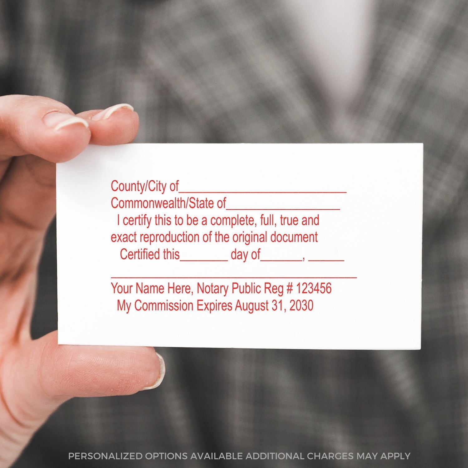 A hand holding a card with red text, stamped with a Regular Notary Certified Copy Stamp, showing certification details and notary information.