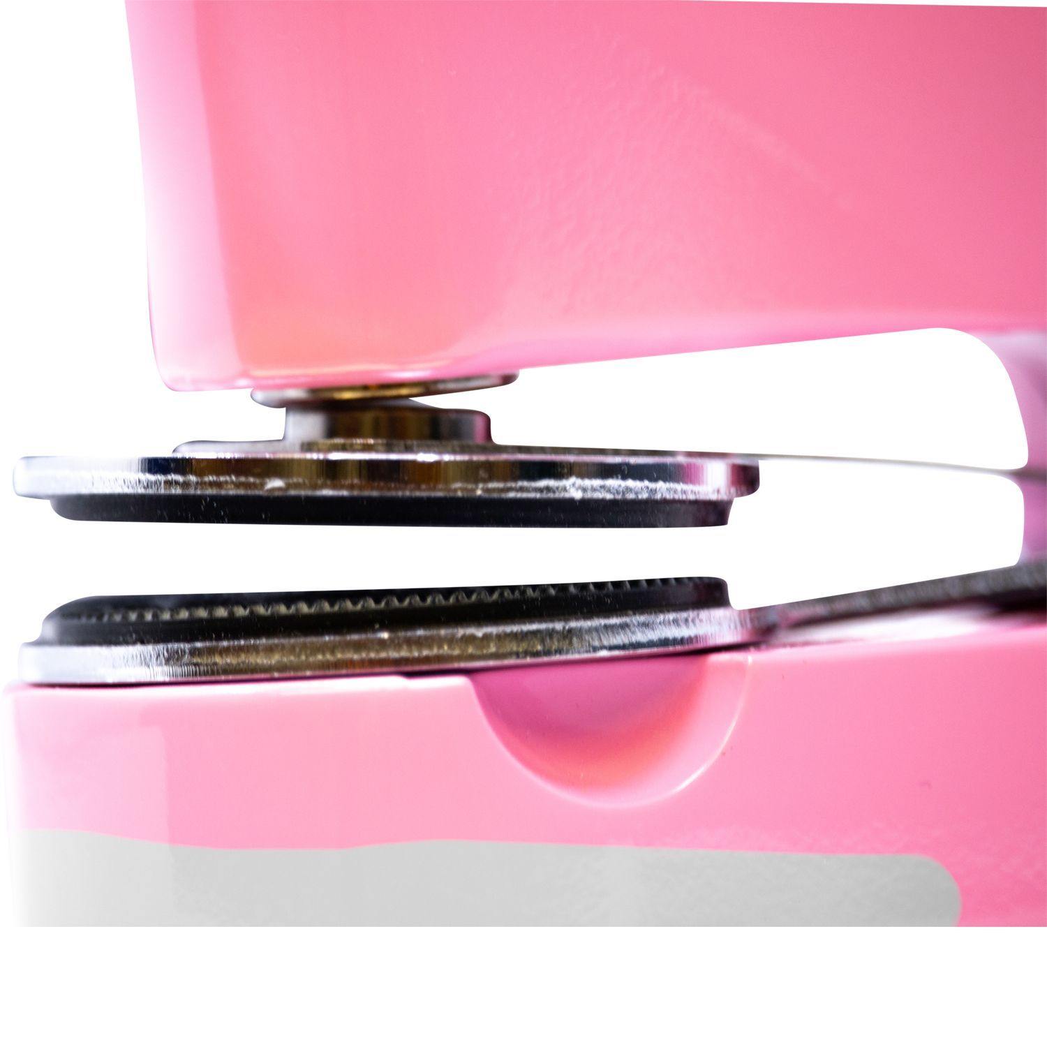 Close-up side view of the Interior Designer Pink Gift Embosser, showing the detailed embossing plates and pink casing.