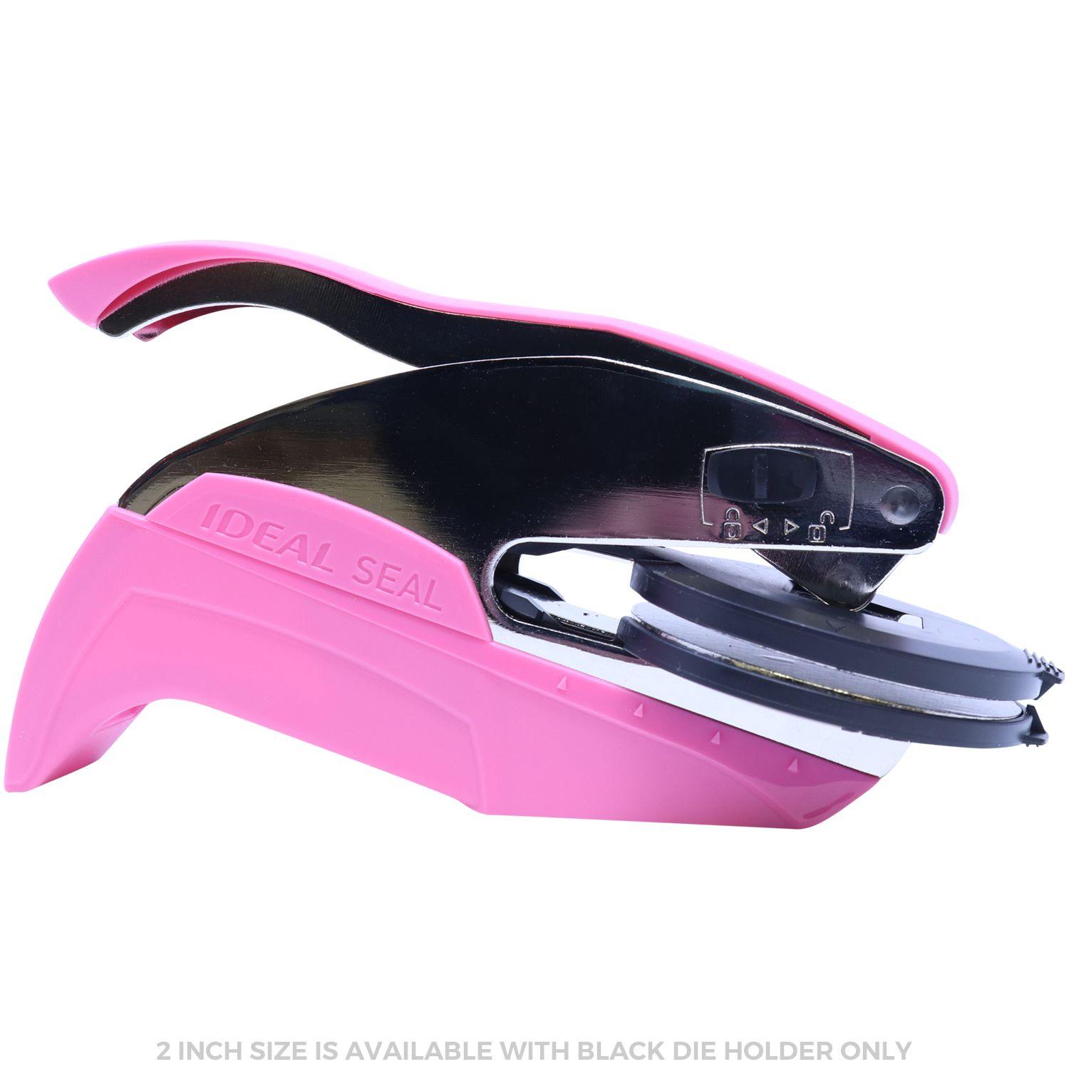 Public Weighmaster Pink Hybrid Handheld Embosser with ergonomic design, black die holder, and IDEAL SEAL branding on the side.