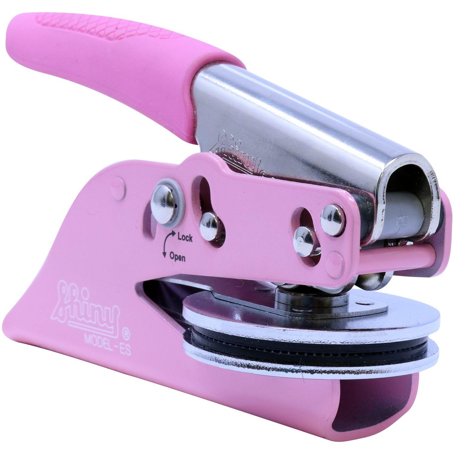 Architect Pink Seal Handheld Embosser with a sleek pink handle and metallic components, designed for creating embossed imprints. The embosser features a lock and open mechanism for ease of use.