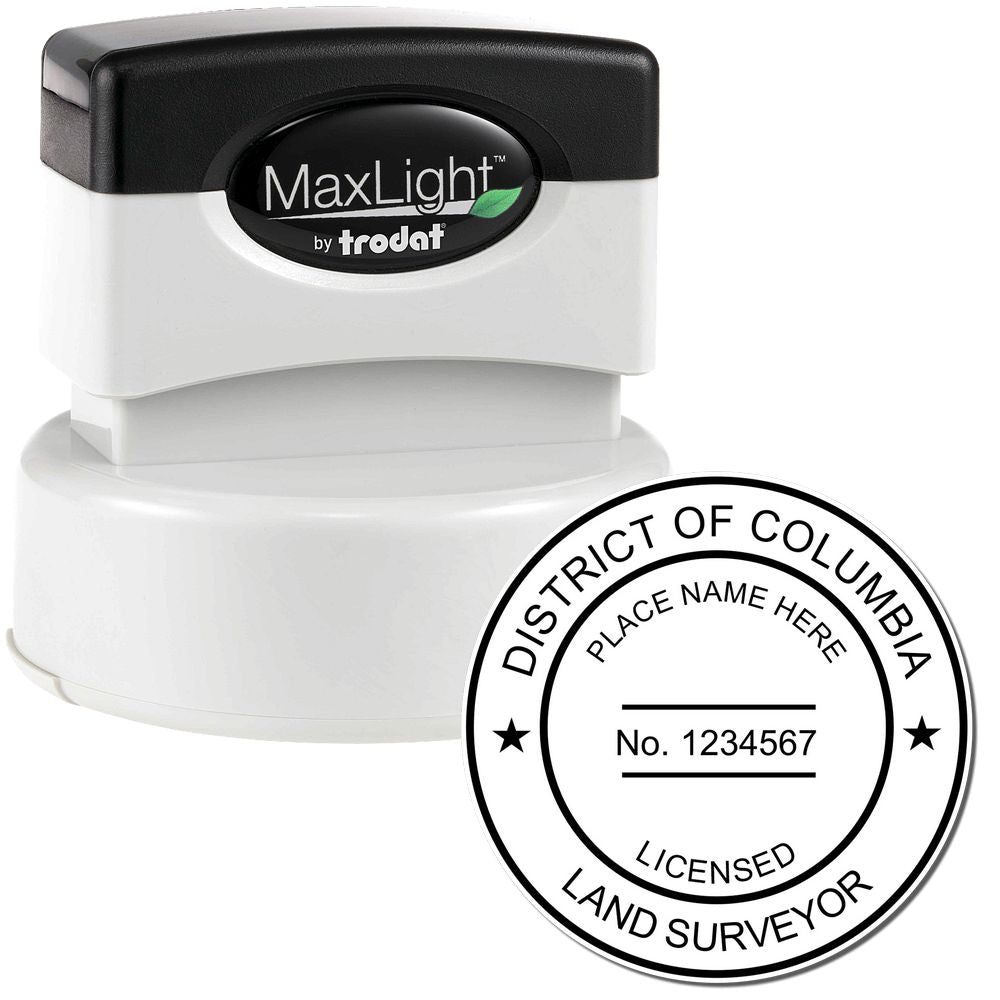 Premium MaxLight Pre-Inked District of Columbia Surveyors Stamp with a black handle and a sample imprint showing licensed land surveyor details.