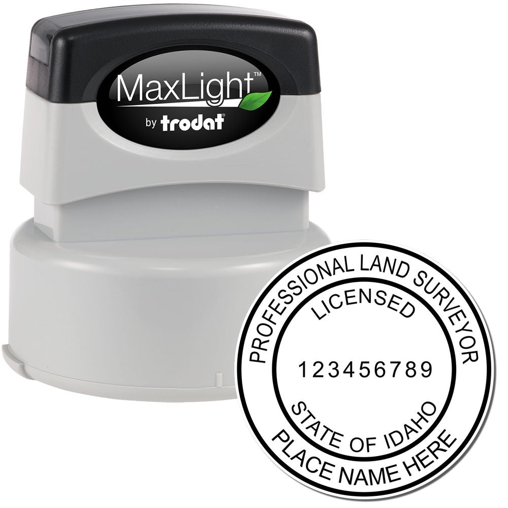 Premium MaxLight Pre-Inked Idaho Surveyors Stamp with a black and gray design, displaying a sample imprint for professional land surveyors.