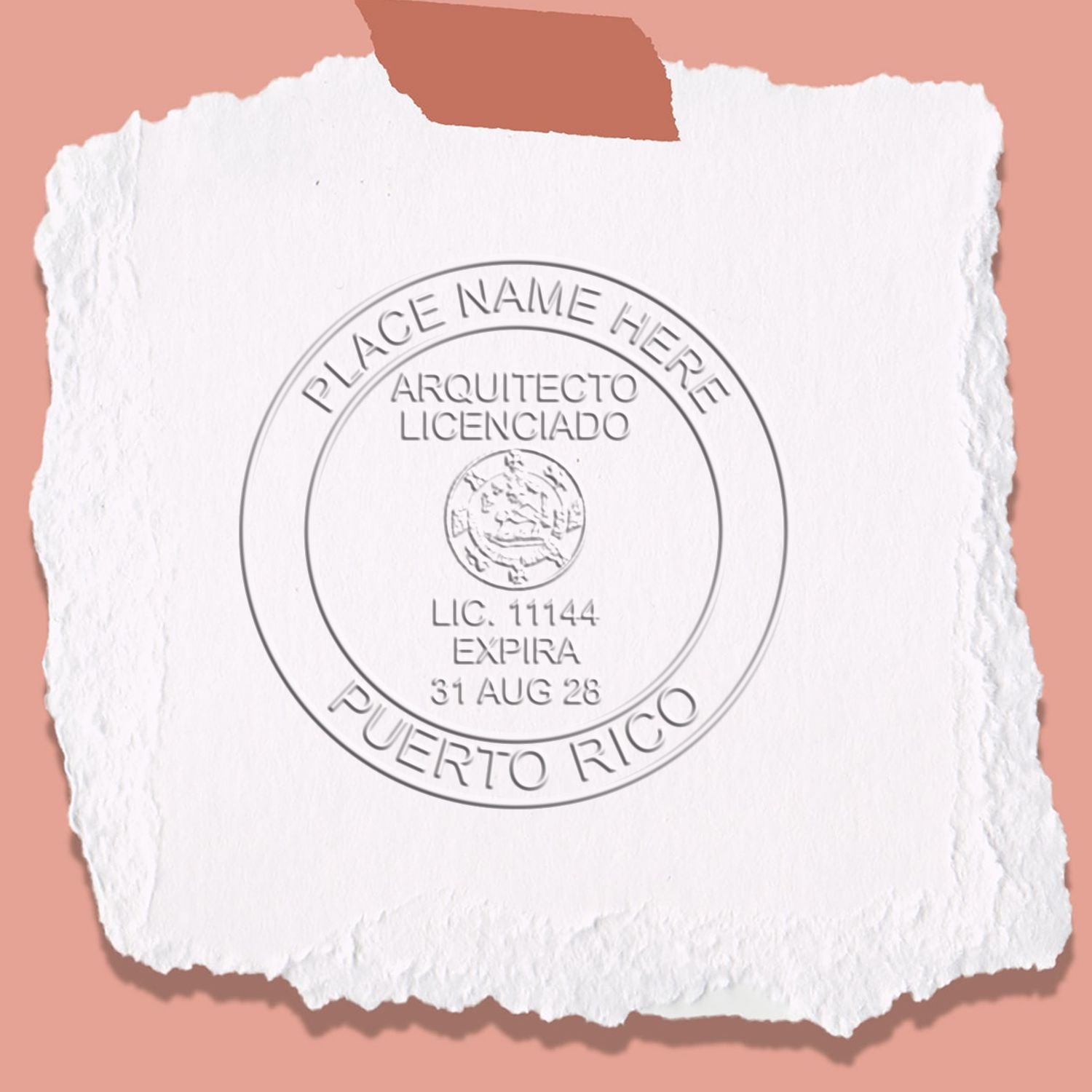 A lifestyle photo showing a stamped image of the Handheld Puerto Rico Architect Seal Embosser on a piece of paper