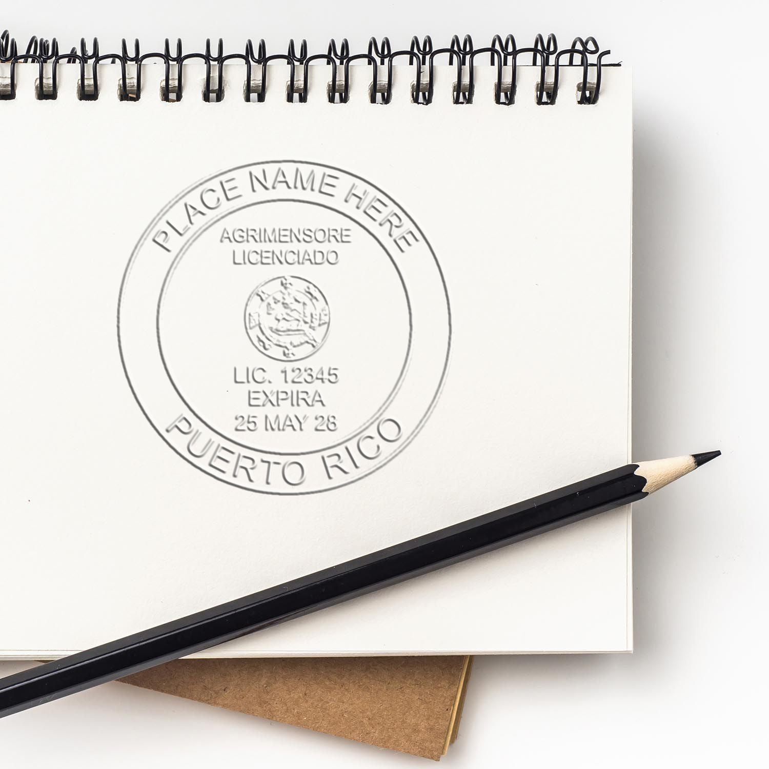 An alternative view of the Hybrid Puerto Rico Land Surveyor Seal stamped on a sheet of paper showing the image in use