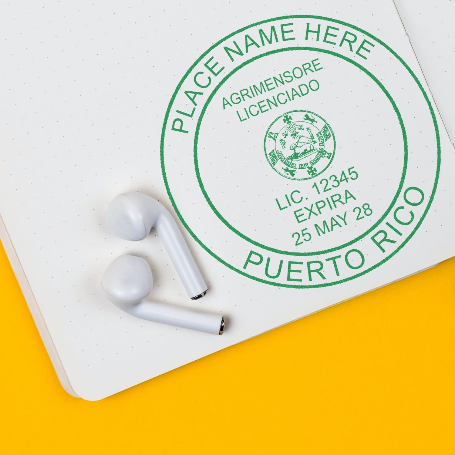 Digital Puerto Rico Land Surveyor Stamp, Electronic Seal for Puerto Rico Land Surveyor, displayed on a notebook with earbuds nearby.