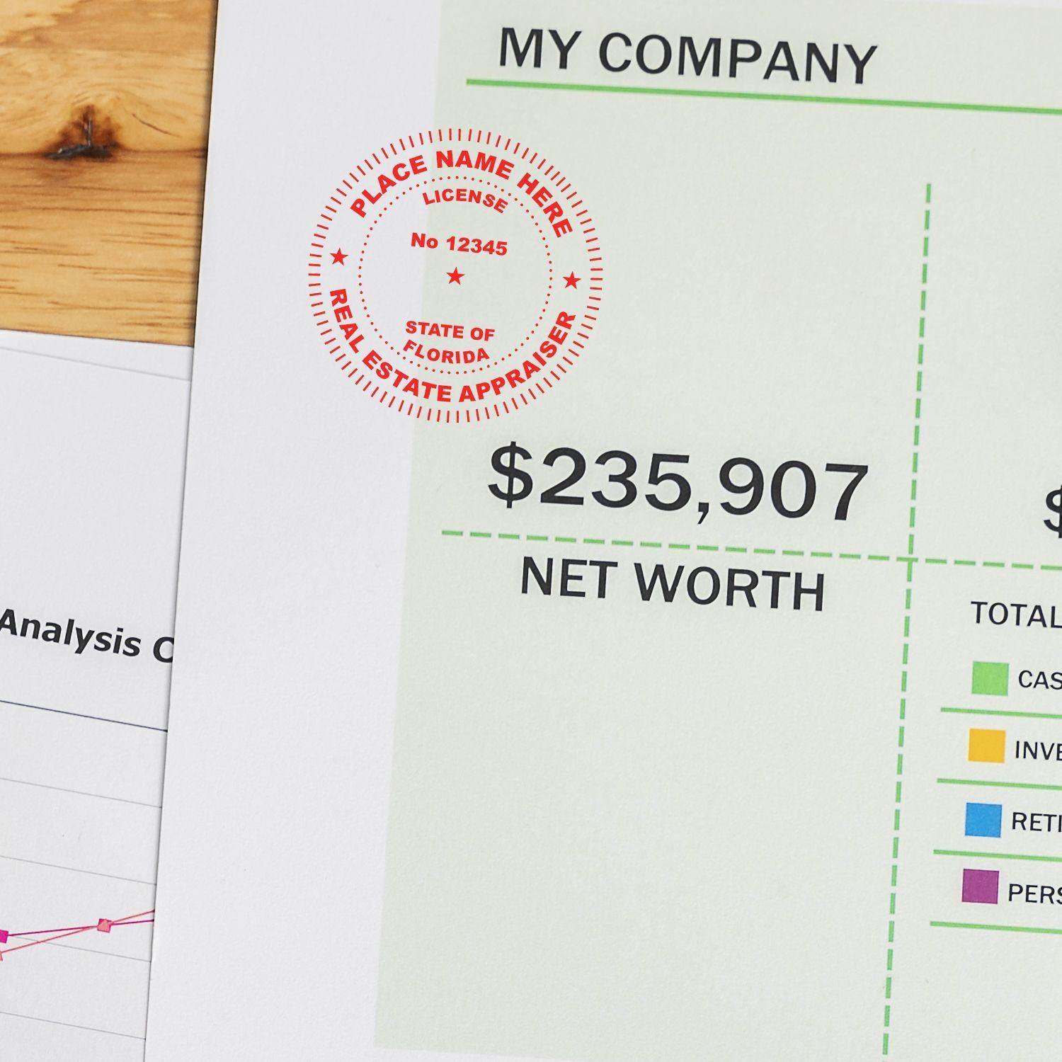 Real Estate Appraiser Self Inking Rubber Stamp of Seal in red ink on a financial document showing net worth and company details.