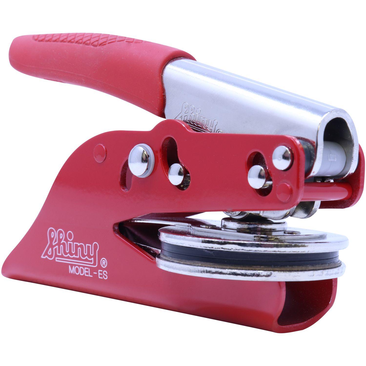 Architect Red Seal Handheld Embosser with a red handle and metal components, designed for creating embossed imprints. The product is labeled Shiny Model-ES and features a compact, ergonomic design.