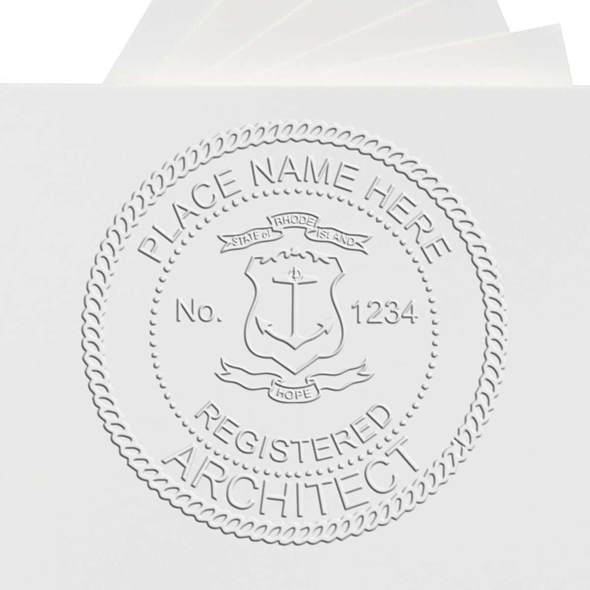 A lifestyle photo showing a stamped image of the Handheld Rhode Island Architect Seal Embosser on a piece of paper