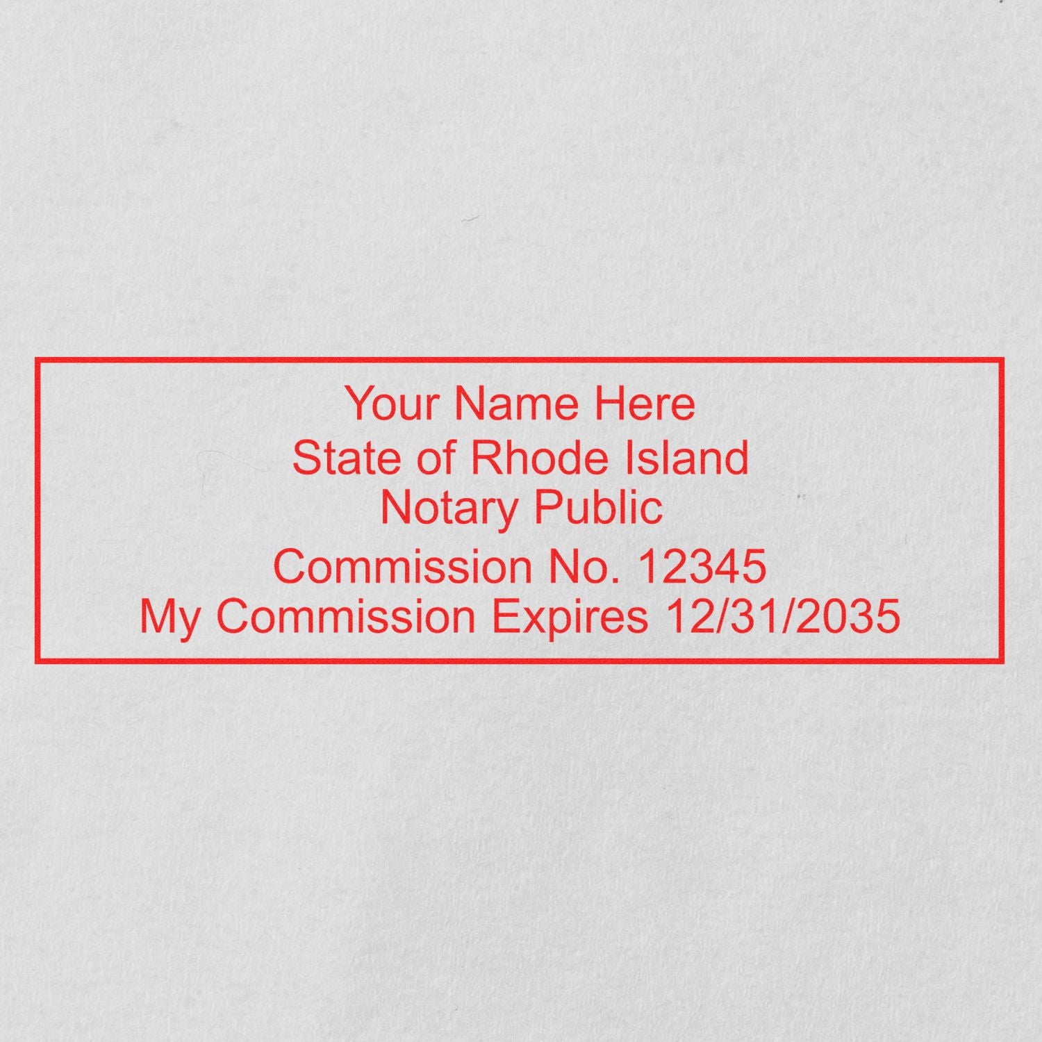 Another Example of a stamped impression of the Super Slim Rhode Island Notary Public Stamp on a piece of office paper.