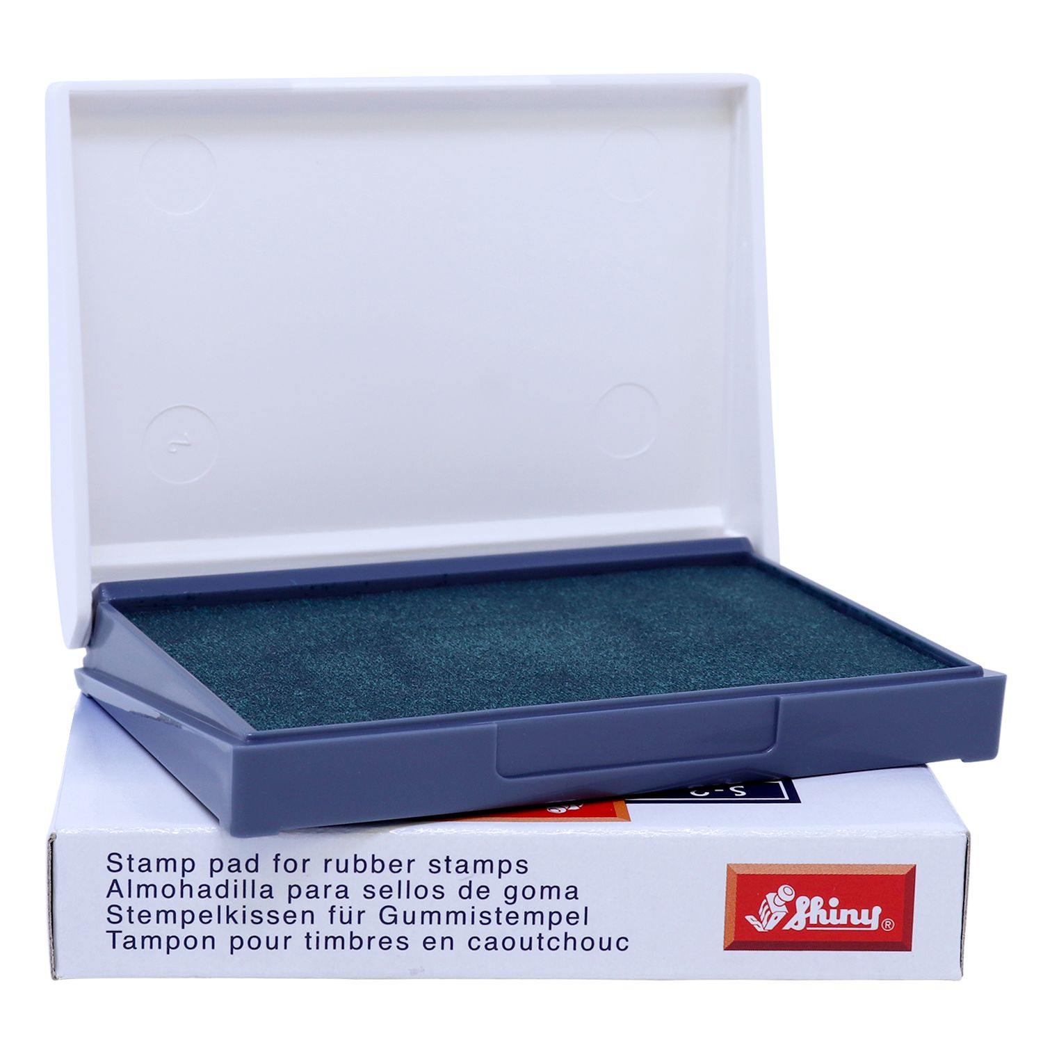 Rubber Stamp Ink Pad 0 Size 2-1/4 x 3-1/2 in green, open with a white lid, placed on a white box with multilingual text.