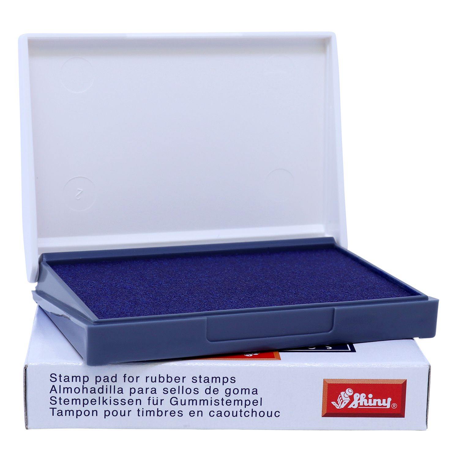 Rubber Stamp Ink Pad 1 Size 2-3/4 x 4-1/4, blue ink pad in an open plastic case, placed on a white box with multilingual text.