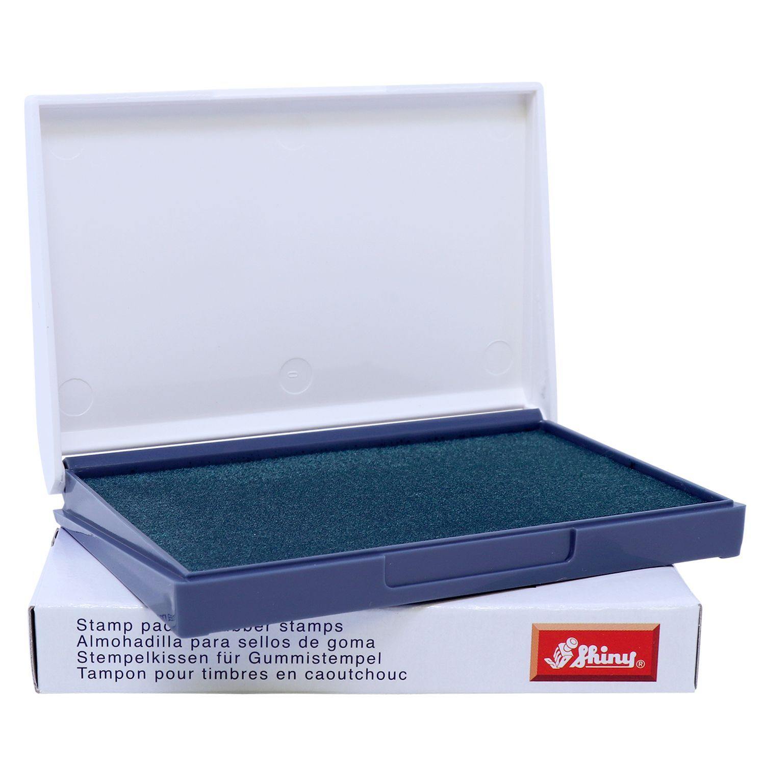 Rubber Stamp Ink Pad 1 Size 2-3/4 x 4-1/4 in green, open with a white lid, placed on a white box with red and white branding.