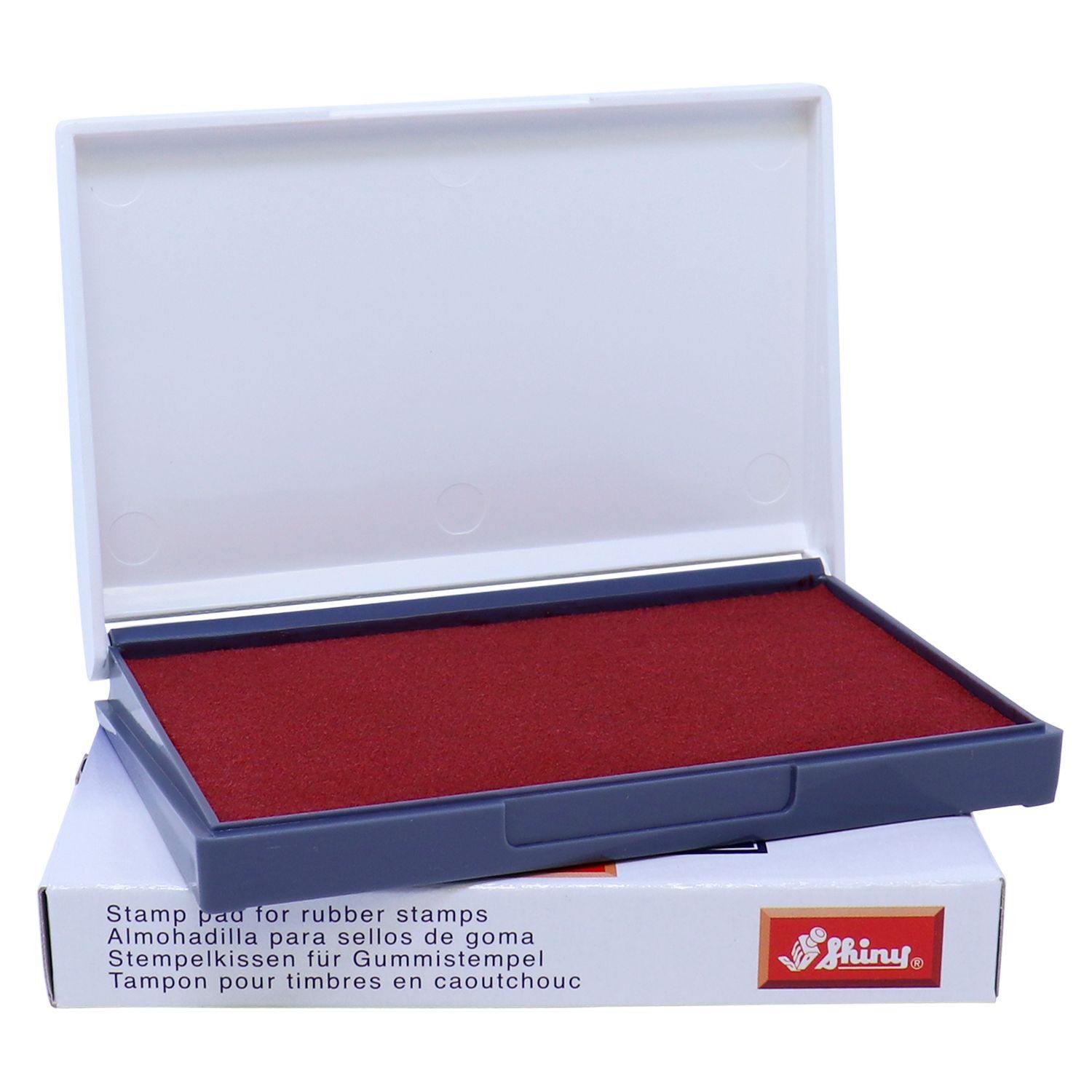 Open Rubber Stamp Ink Pad 1 Size 2-3/4 x 4-1/4 with red ink, placed on its packaging box, ready for use.