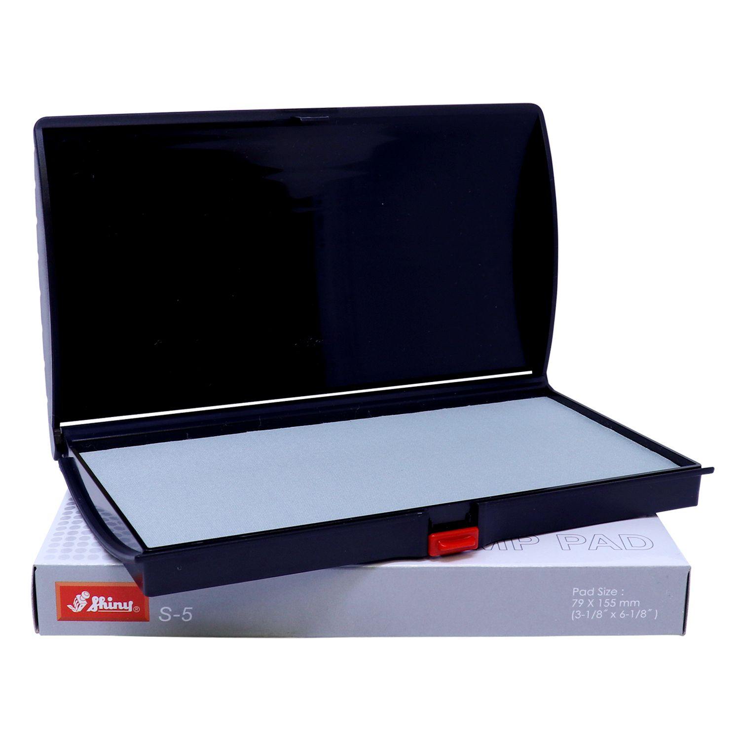 Rubber Stamp Ink Pad 2 Size 3-1/4 x 6-1/4, black plastic case with a grey pad, placed on a white box with red and white branding.