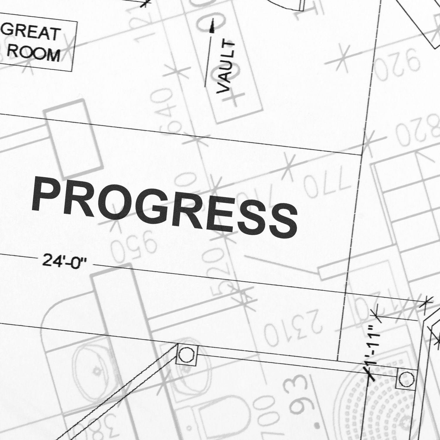 Architectural blueprint with the word 'PROGRESS' stamped using a Self Inking Progress Stamp, highlighting project advancement.