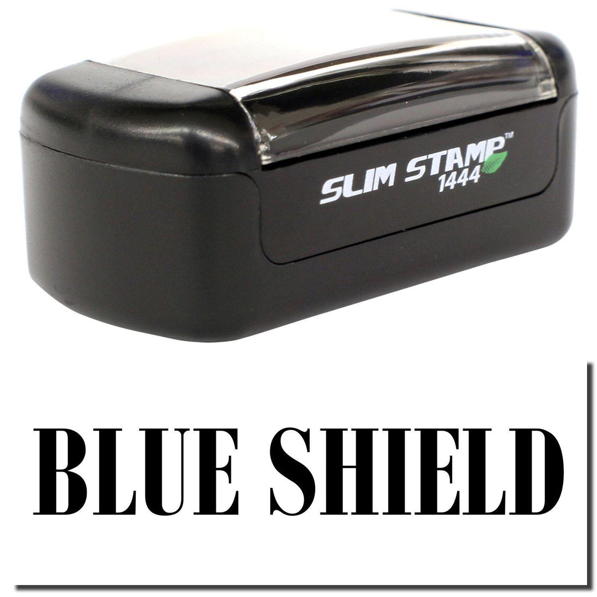A stock office pre-inked stamp with a stamped image showing how the text &quot;BLUE SHIELD&quot; is displayed after stamping.