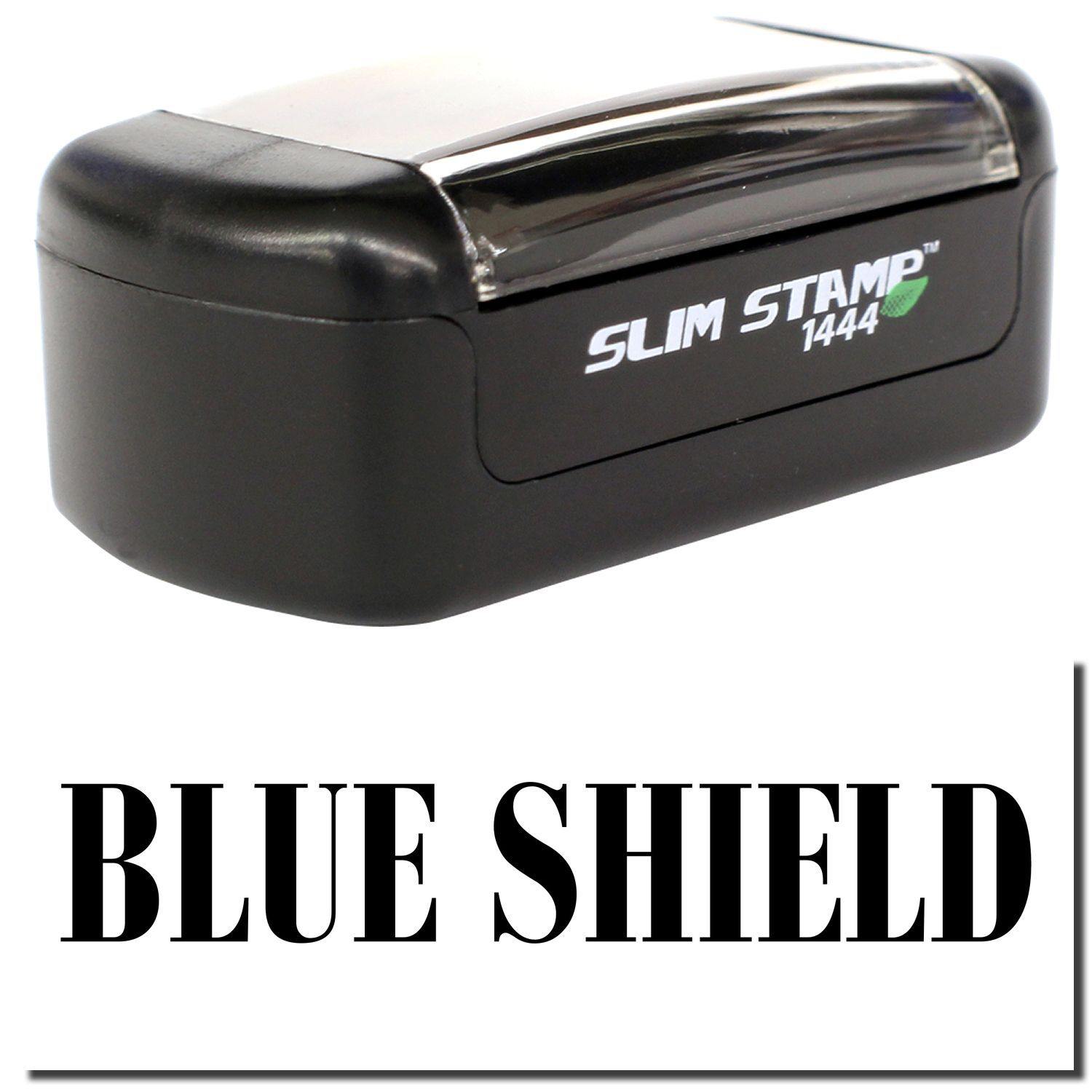 A stock office pre-inked stamp with a stamped image showing how the text "BLUE SHIELD" is displayed after stamping.