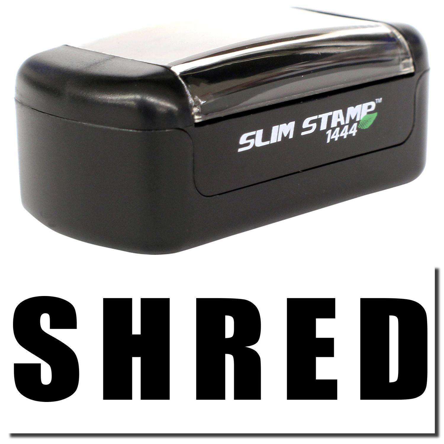 A stock office pre-inked stamp with a stamped image showing how the text "SHRED" in bold font is displayed after stamping.