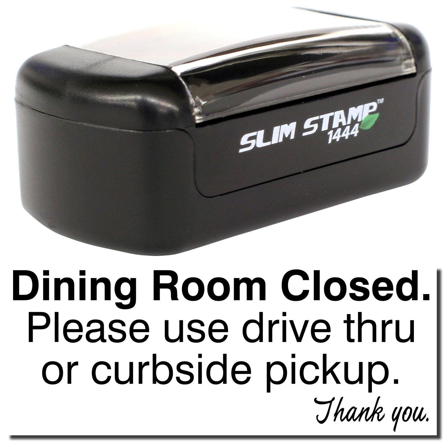 A stock office pre-inked stamp with a stamped image showing how the text "Dining Room Closed. Please use drive thru or curbside pickup. Thank you." is displayed after stamping.