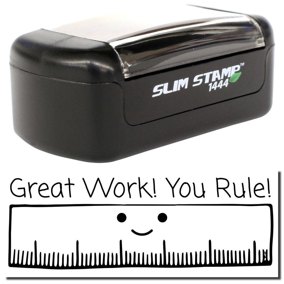 A stock office pre-inked stamp with a stamped image showing how the text &quot;Great Work! You Rule!&quot; with a large image of a ruler with a smiling face is displayed after stamping.