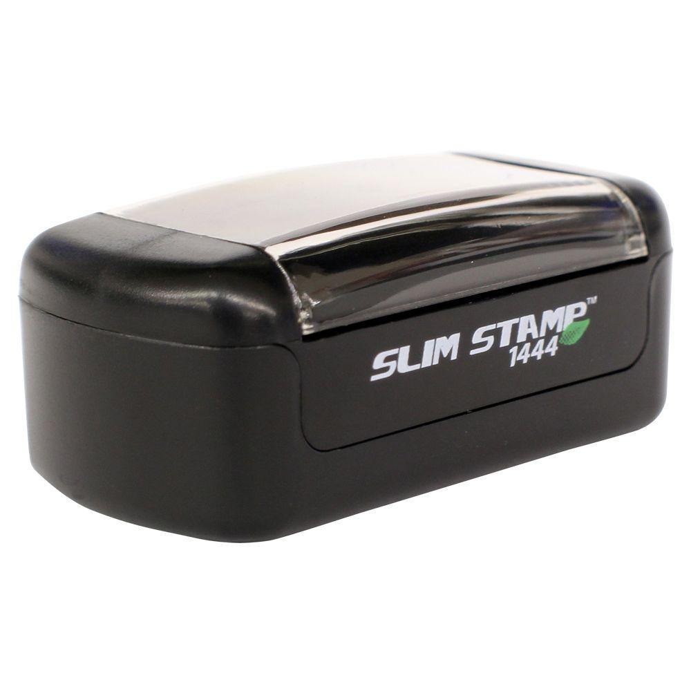 Slim Pre-Inked No Aceptamos Devolucions Stamp, black rectangular design with clear top, labeled 'Slim Stamp 1444'.