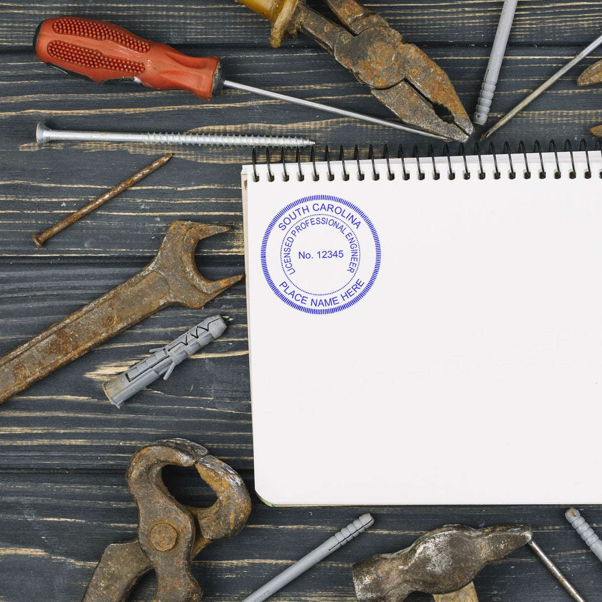 A stamped impression of the South Carolina Professional Engineer Seal Stamp in this stylish lifestyle photo, setting the tone for a unique and personalized product.