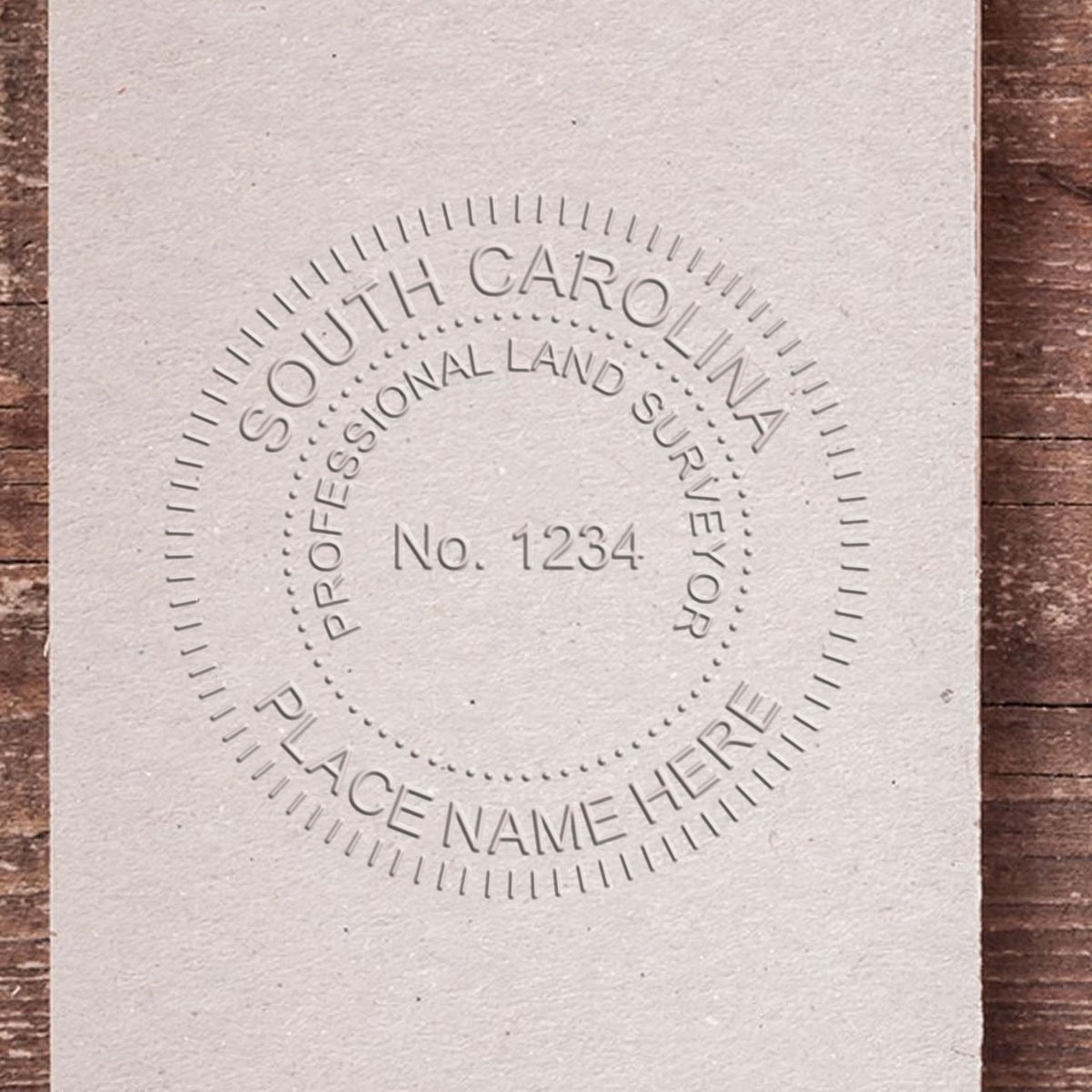 A photograph of the State of South Carolina Soft Land Surveyor Embossing Seal stamp impression reveals a vivid, professional image of the on paper.