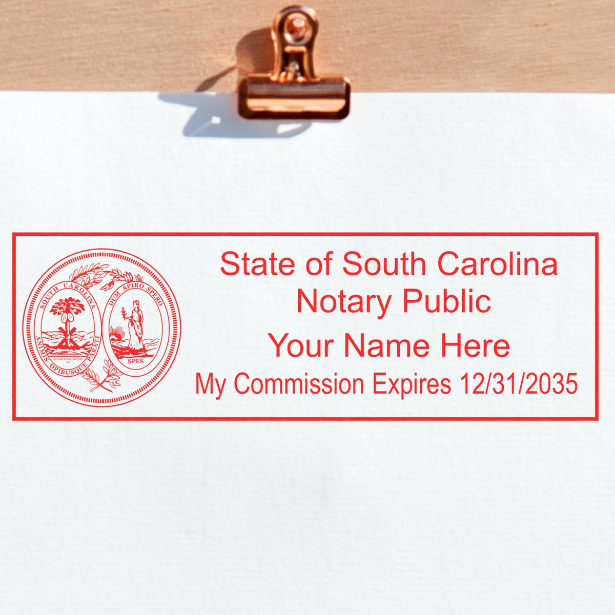 A stamped impression of the Wooden Handle South Carolina State Seal Notary Public Stamp in this stylish lifestyle photo, setting the tone for a unique and personalized product.