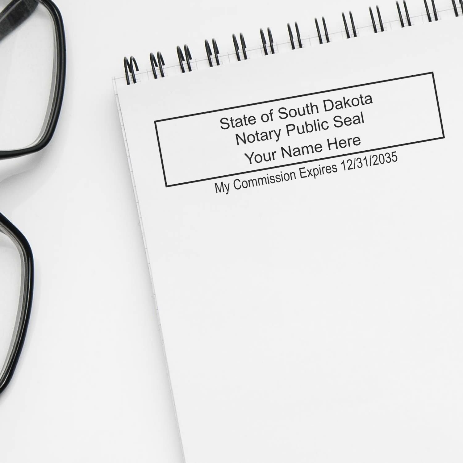 This paper is stamped with a sample imprint of the Super Slim South Dakota Notary Public Stamp, signifying its quality and reliability.