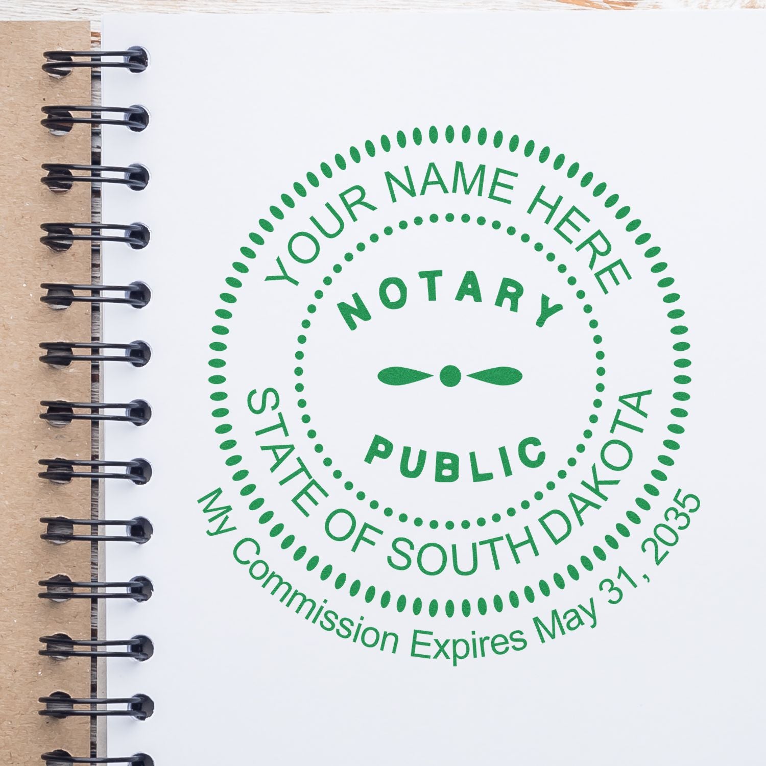 A photograph of the Heavy-Duty Round South Dakota Notary Stamp stamp impression reveals a vivid, professional image of the on paper.