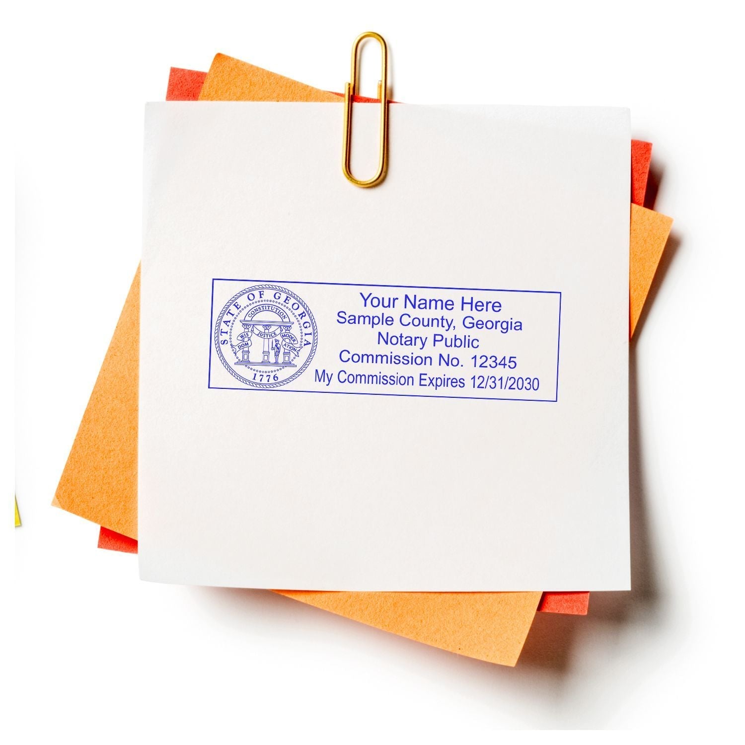 Super Slim Pre-Inked State Seal Notary Stamp used on a white paper clipped to orange and yellow papers, displaying a notary public seal.