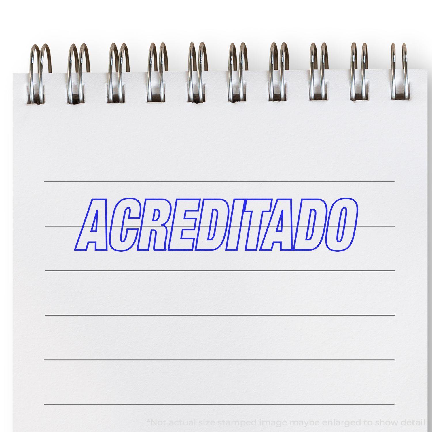 A self-inking stamp with a stamped image showing how the text "ACREDITADO" in an outline style is displayed after stamping.