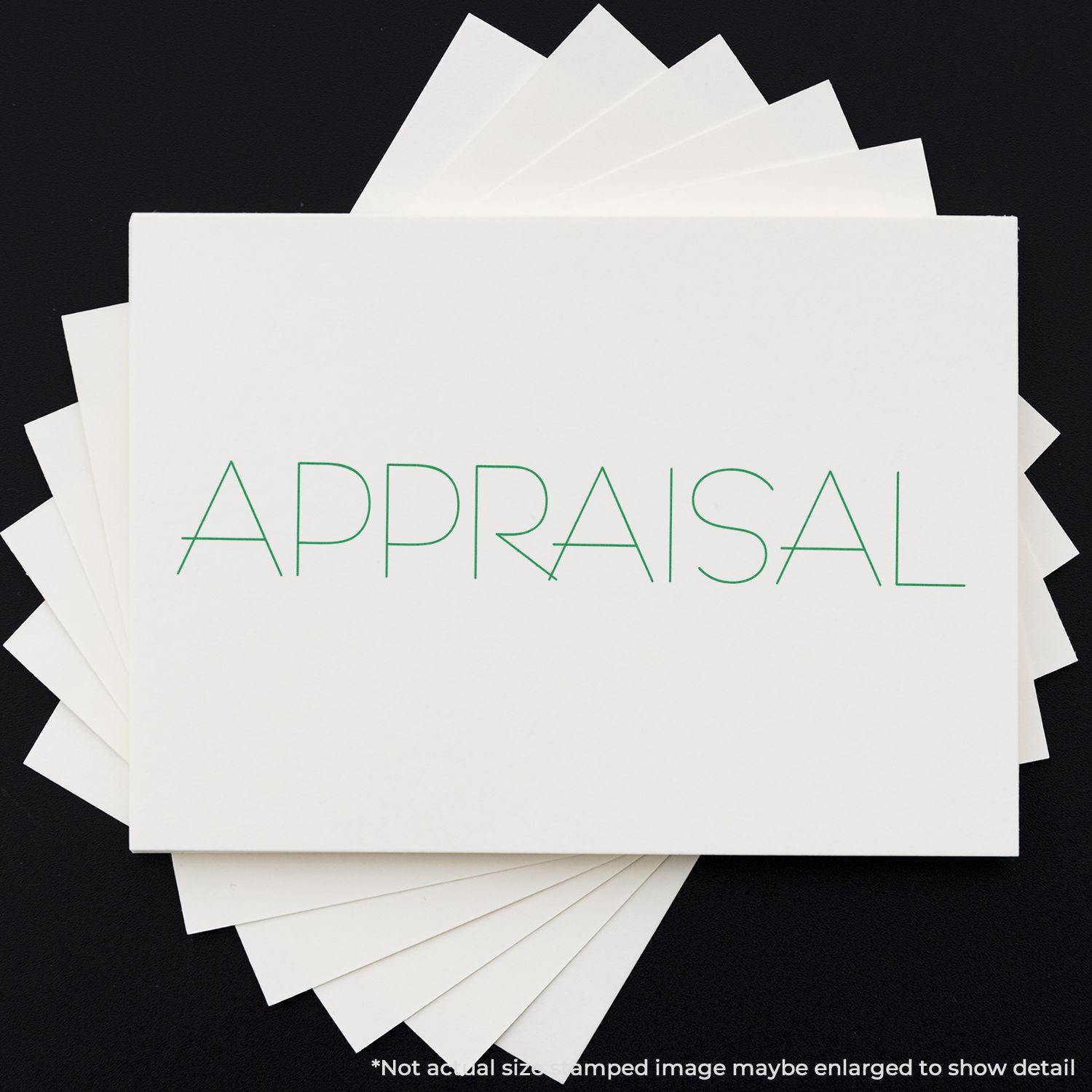 Appraisal rubber stamp on white paper with green ink, surrounded by additional blank sheets, on a black background.