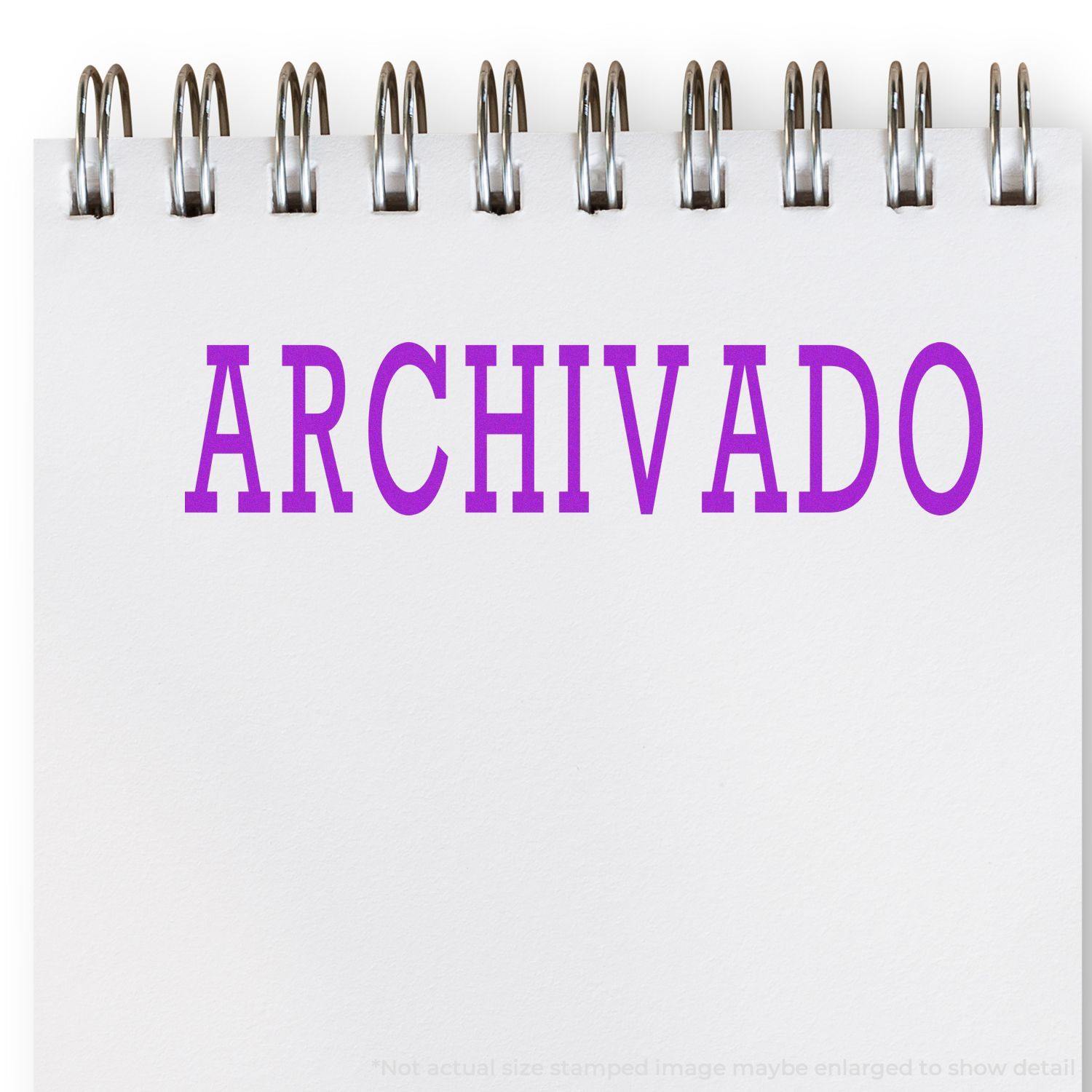 A notebook with the word ARCHIVADO stamped in purple using a Self Inking Archivado Stamp.