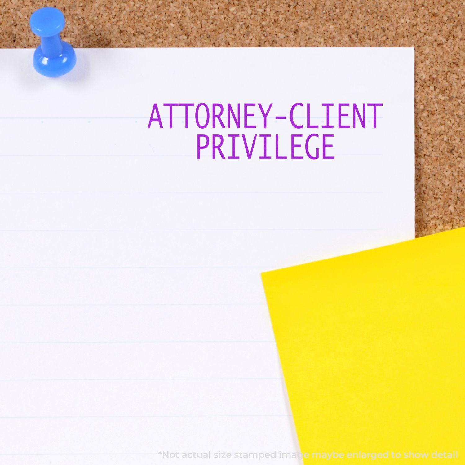 Attorney Client Privilege rubber stamp impression on white paper pinned to a corkboard, with a yellow sticky note beside it.