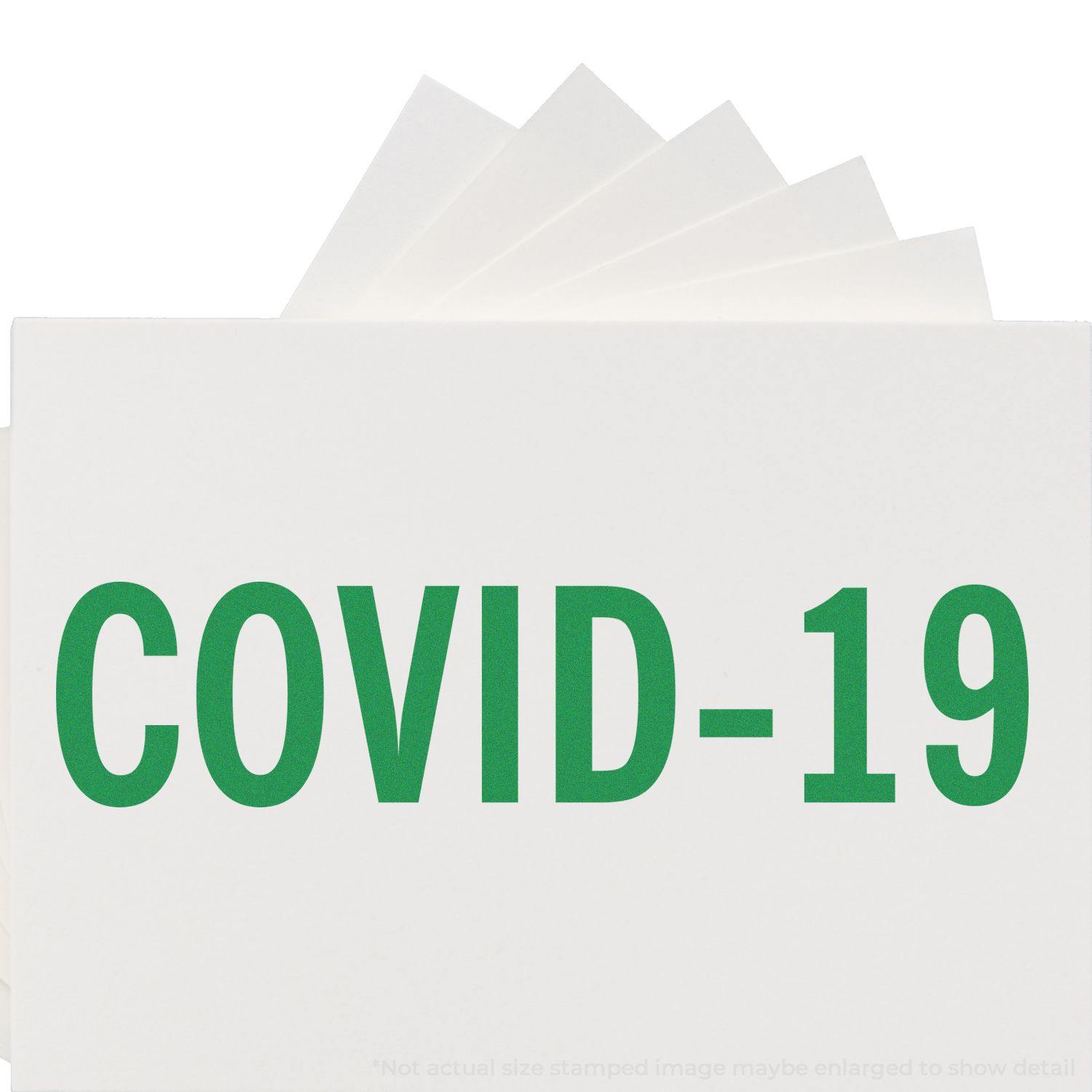 Slim Pre-Inked Bold Covid-19 Stamp imprint in green on white paper, showcasing clear and bold text.