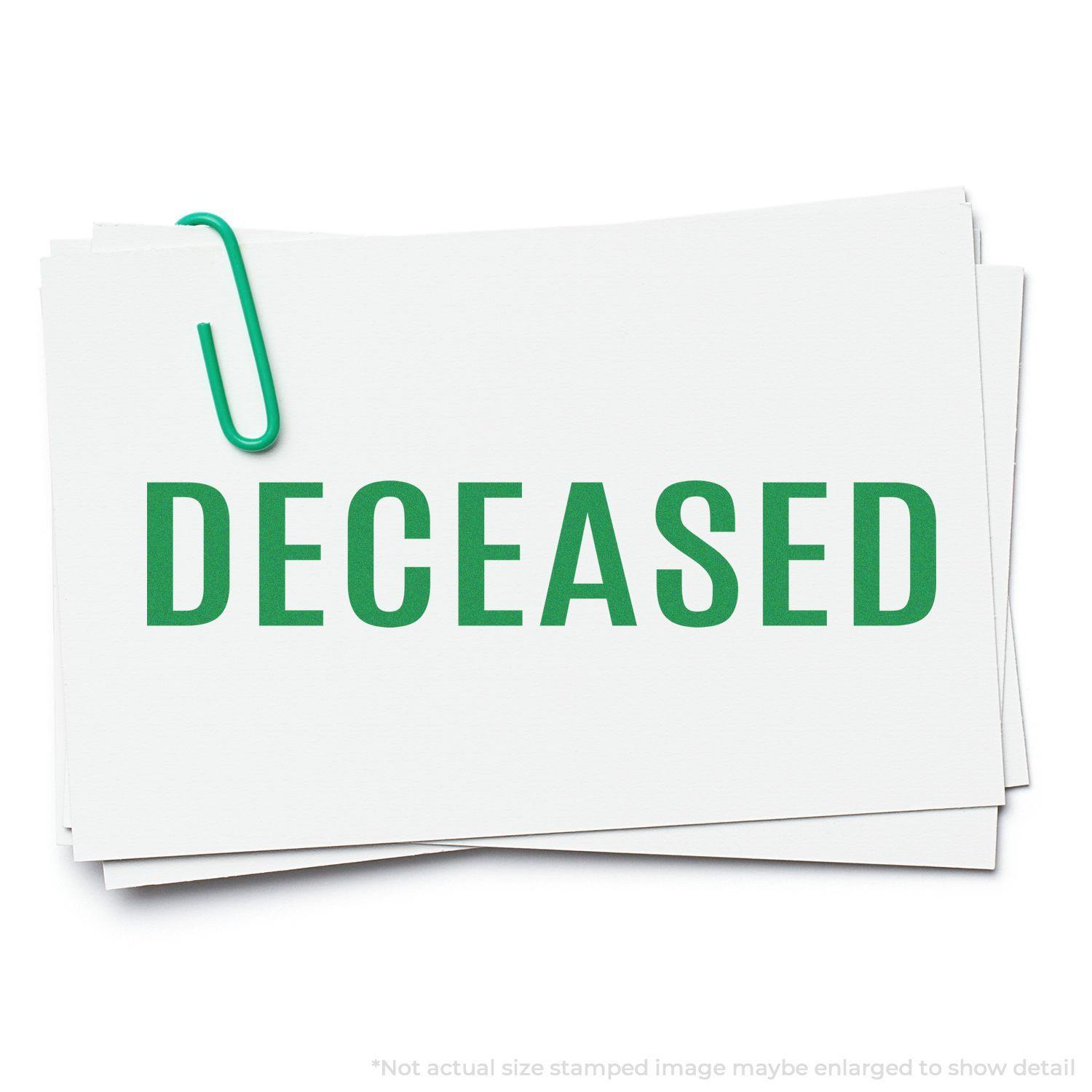 Large Bold Deceased Rubber Stamp in green ink on white paper, clipped together with a green paperclip.