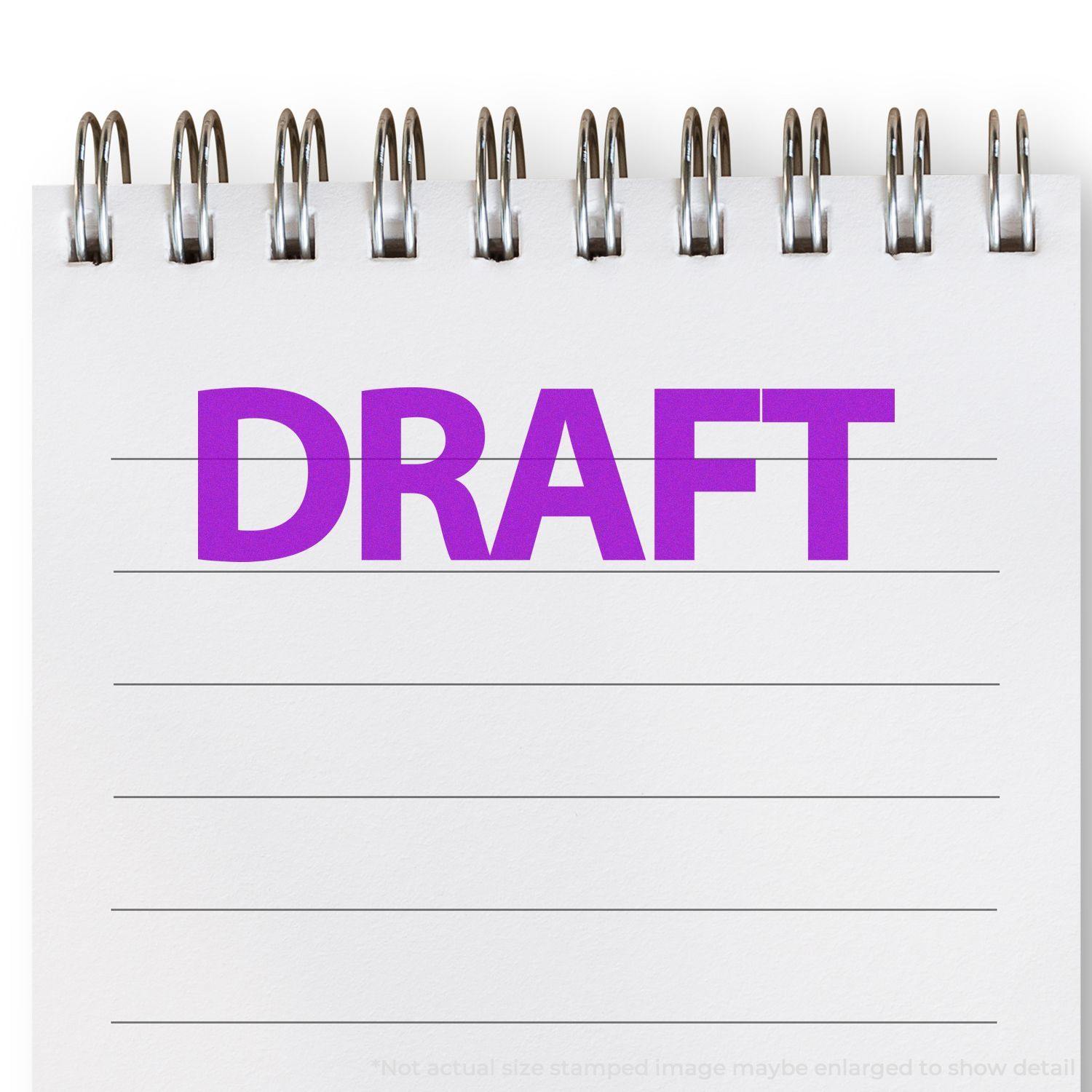 Large Self Inking Bold Draft Stamp in purple ink on a spiral notebook page with horizontal lines.