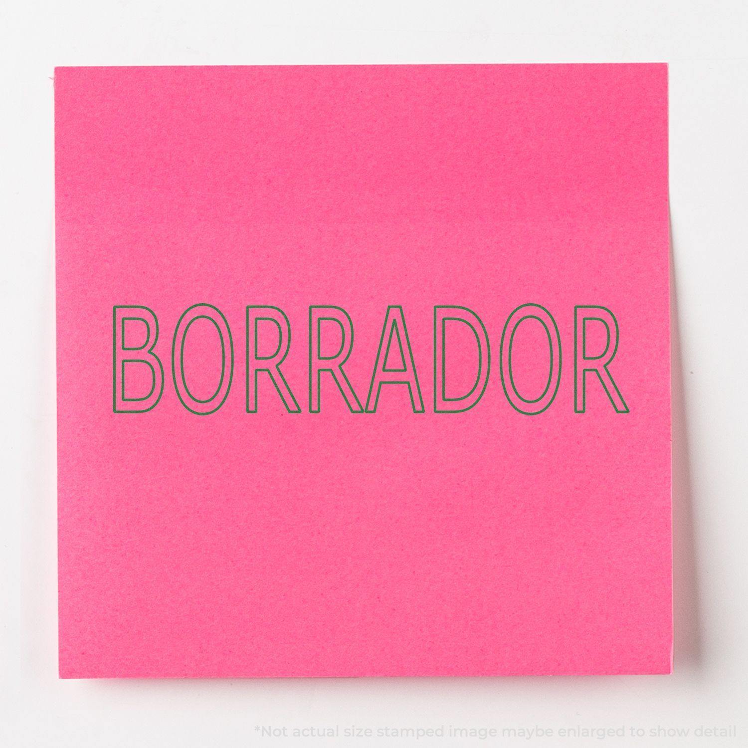 A stock office rubber stamp with a stamped image showing how the text "BORRADOR" in an outline font is displayed after stamping.