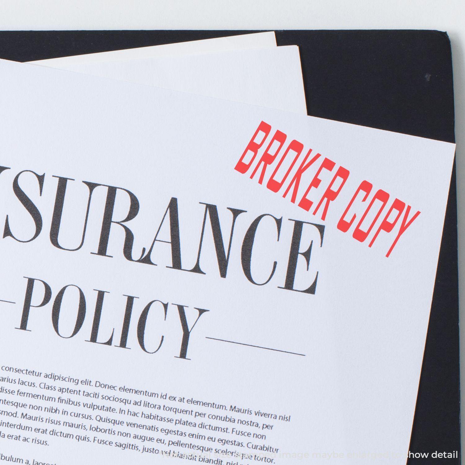 Insurance policy document with a red 'BROKER COPY' rubber stamp mark on the top right corner.